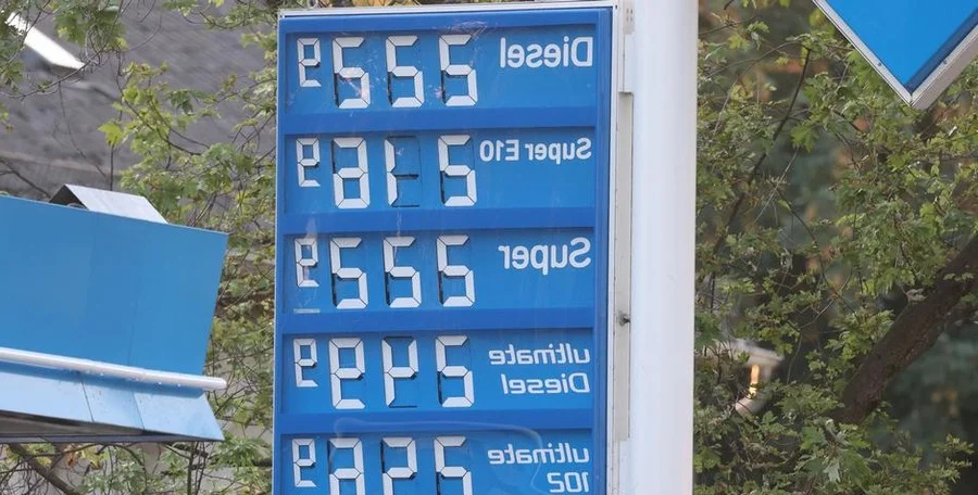 Car refueling at gas station